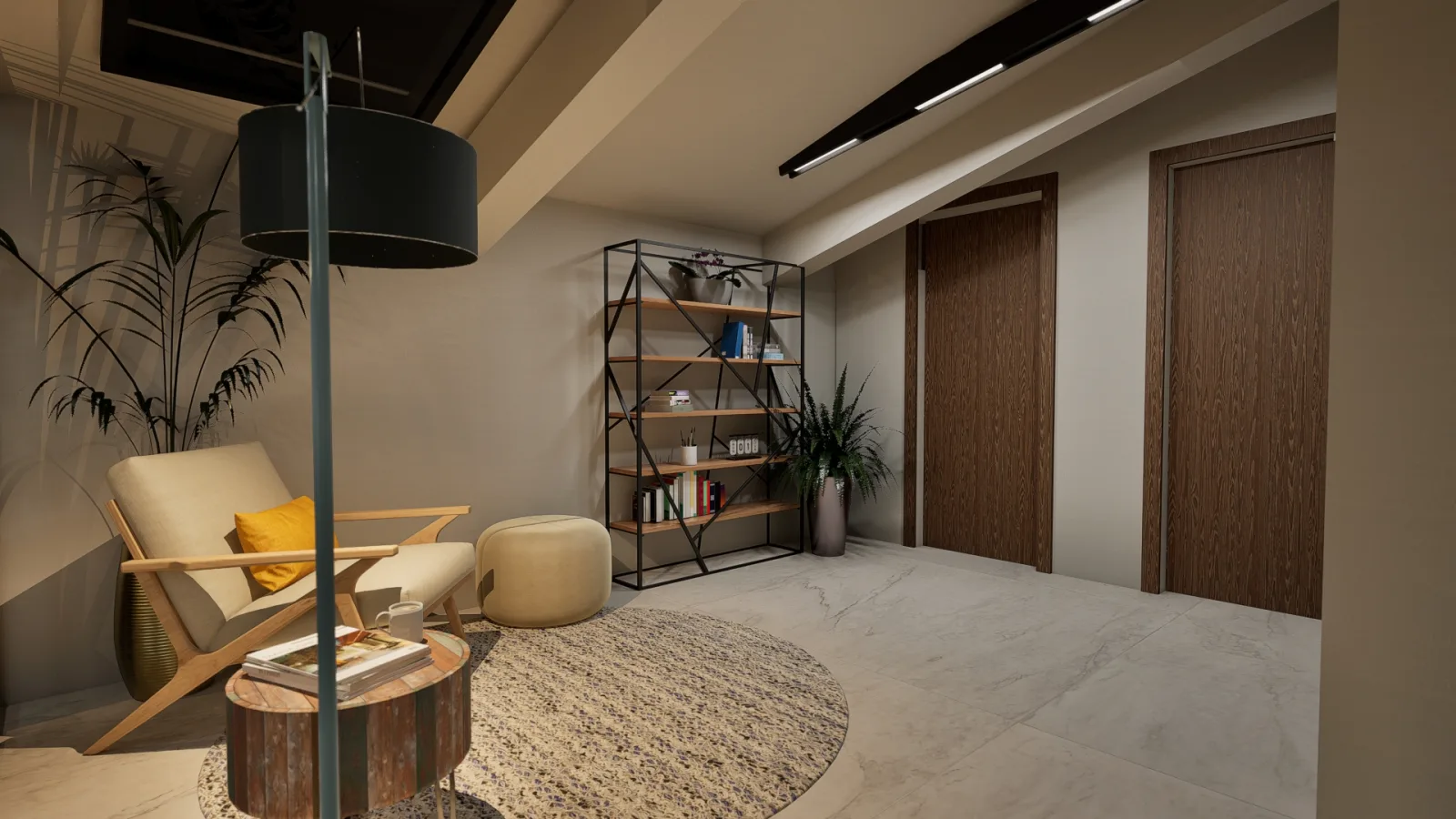 Sala lettura con poltrona e libreria